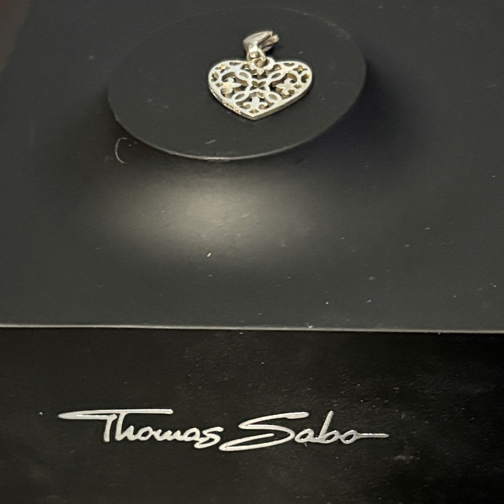 Thomas Sabo Intricate Silver Heart charm for bracelet or necklace.